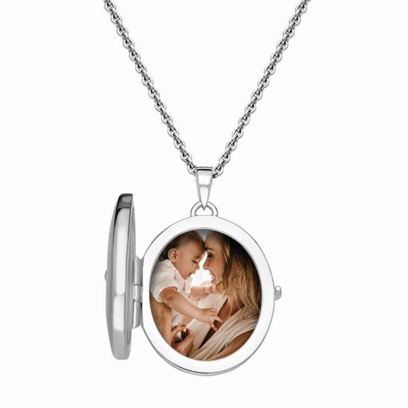 Sterling Silver Cubic Zirconia Star Centre Oval Keepsake Locket